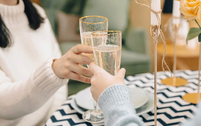 friends making a toast at a dinner, Auckland holidays, October 2024, NZ