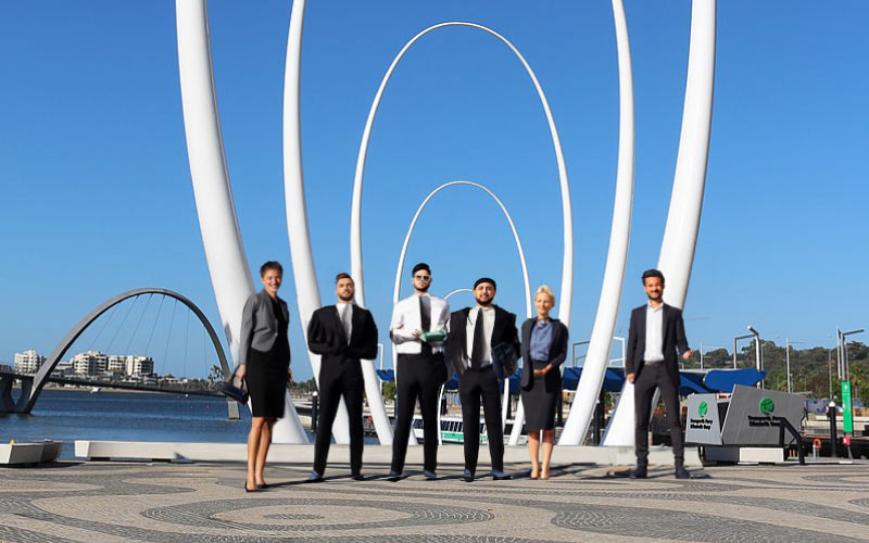 company team posing together at the esplanade, affordable coach charter, August 2024, Australia