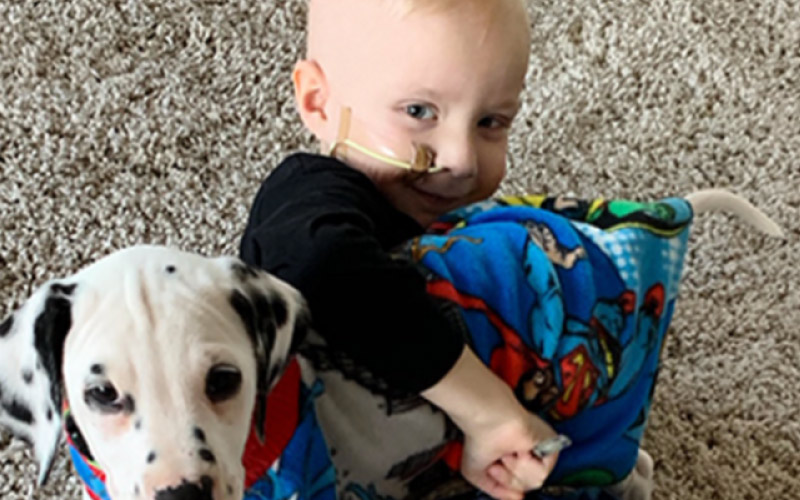 Hunter with his Dalmatian puppy, Rocky, granted by Starlight Wishes