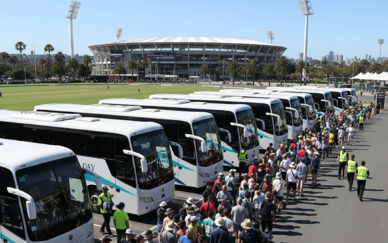 Group of cricket fans disembarking an air-conditioned coach for Ashes match-day transport in Australia